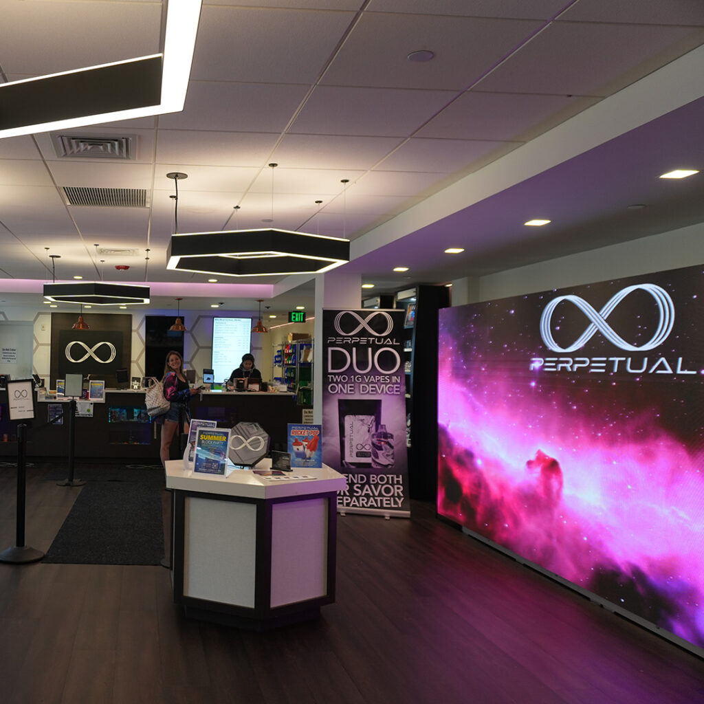 Interior shopping area at PERPETUAL cannabis dispensary in Millbury, MA